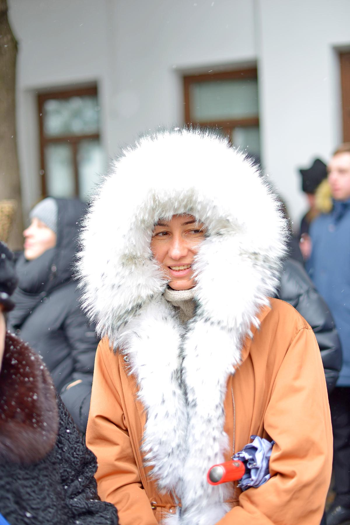 Kiev-Pechersk Lavra, an Orthodox woman in a down jacket, a woman in a jacket Alaska Киево-Печерская лавра, православная женщина в пуховике , женщина в куртке Аляска 